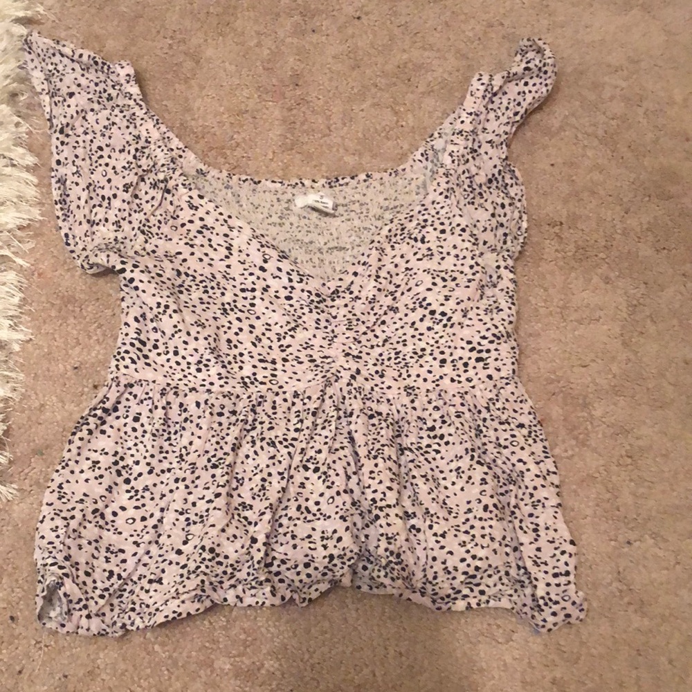 Cute, ruffly animal print top.